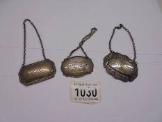 Three silver decanter labels, Brandy/Sherry/Port, 23 grams excluding chains.