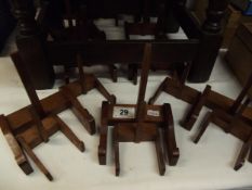 A quantity of wooden plate stands (approx 20)