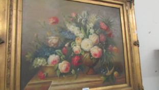 A gilt framed floral oil on canvas, COLLECT ONLY.