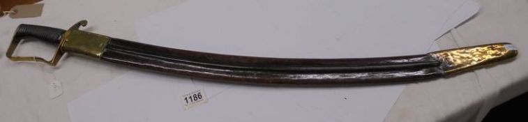 A Victorian sword in scabbard.
