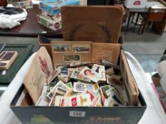 A box of cigarette cards