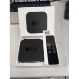 A boxed Apple 4K TV box