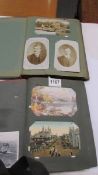 Two albums of old postcards.