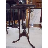 A mahogany tripod wine table. COLLECT ONLY.