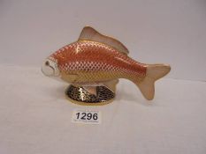 A Royal Crown Derby fish paperweight with stopper.