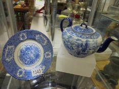 An early 20th century blue & white teapot and plate by H M & Co., England, No.122.