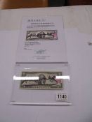 An Andy Warhol signed two dollar bill in perspex frame with certificate of authenticity.