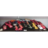 A good selection of unboxed die cast racing cars including Corgi, Matchbox & Polistil etc.