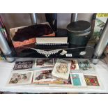 A mixed lot including postcards, costume jewellery, boxed fur glove/muff & box of shirt collars