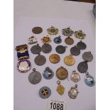 A quantity of medallions.