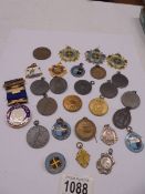 A quantity of medallions.