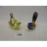 A Royal Crown Derby Greenfinch and Long Tailed tit paperweights with stoppers.
