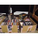 A large lot of CD's plus some DVD's + cassette tapes, DVD Boxes + headphones