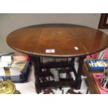 A dark oak drop leaf coffee table height 46cm, top 55cm x 68cm COLLECT ONLY