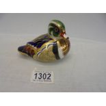 A Royal Crown Derby duck paperweight with stopper.