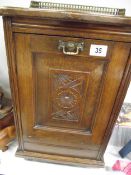 An Edwardian oak coal purdonium with classical brass galley, height 55cm - COLLECT ONLY