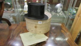 A Dunn & Co., top hat in original box, no size markings but possibly small.