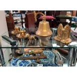 Selection of brassware including ships bell, bookends etc.