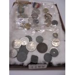 A quantity of medals and coins.