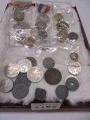 A quantity of medals and coins.