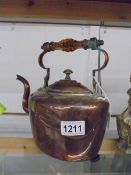 An oval copper kettle