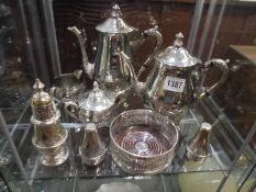 A four piece silver plate tea set and other silver plate.