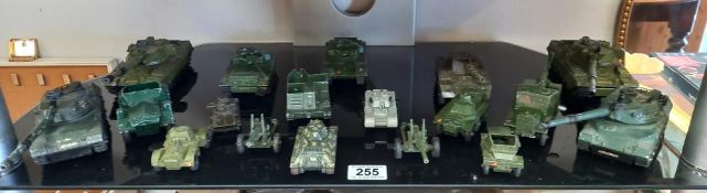 A quantity of unboxed die cast military vehicles including Dinky, Corgi & Lone Star