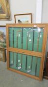 A cased display of six vintage golf clubs, COLLECT ONLY.