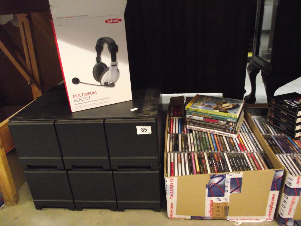 A large lot of CD's plus some DVD's + cassette tapes, DVD Boxes + headphones - Image 3 of 3