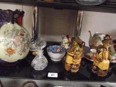 A quantity of pottery including 2 oriental figures, Japanese teaset etc