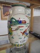 A Japanese vase featuring soldiers and cavalry.