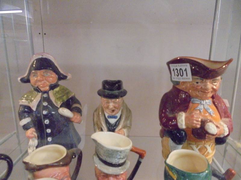 Six small Doulton character jugs, Doulton Churchill jug, Doulton Toby jugand Wedgwood town crier jug - Image 2 of 2