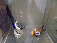 A USSR magpie and a Made in Russia Duck.