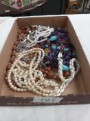 A mixed lot of necklaces including pearls