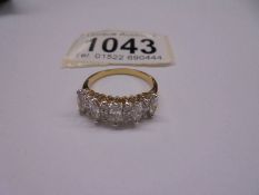 A 9ct gold ring set clear stones, size R, 3.17 grams.