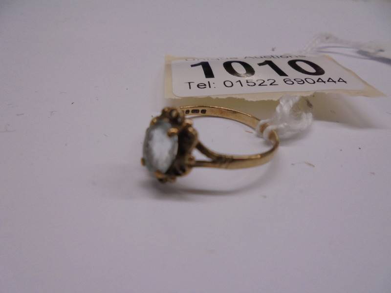 A 9ct yellow gold topaz ringm size O, 1 .6 grams. - Image 2 of 2