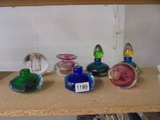 Seven pieces of studio glass including scent bottles (some missing stoppers).