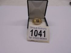 A 9ct gold Clodagh ring with motto, size R, 4.2 grams.