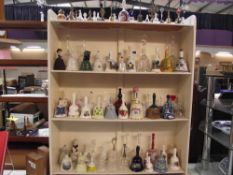 4 shelves of collectable china of glass bells