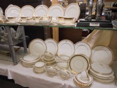 In excess of sixty pieces of Royal Worcester 'Golden Anniversary' pattern tea & dinner ware, COLLECT