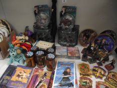 A quantity of Harry Potter memorabilia including plate, figures & DVD's etc