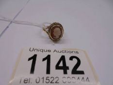 A vintage cameo ring profile of a female in 9ct gold, size K, 2.6 grams.
