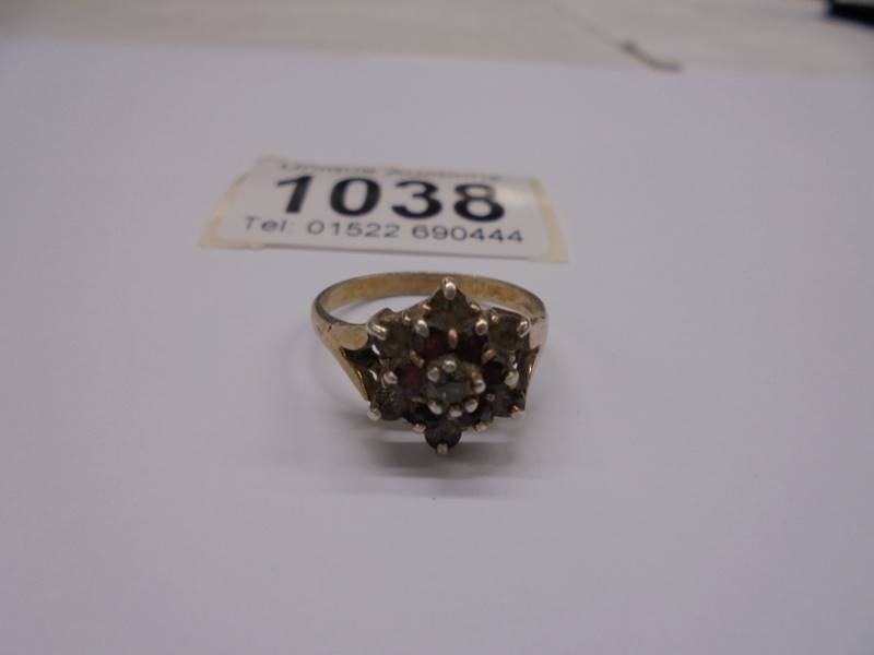 A 9ct gold cluster ring, size Q, 2.91 grams, (needs cleaning).