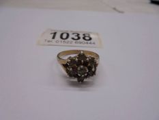 A 9ct gold cluster ring, size Q, 2.91 grams, (needs cleaning).