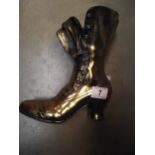 A large vintage brass ladies Victorian style boot match holder height 25cm