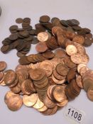 A large lot of copper pennies and halfpennies.