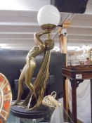 A tall vintage plaster figure lamp of an art deco lady, 66cm tall. COLLECT ONLY