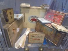 A quantity of collector's tins etc.,
