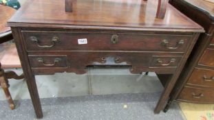 An early 19th century oak lowboy. COLLECT ONLY.