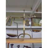A set of Victorian brass balance scales.